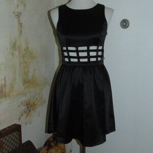 Nameless Brand Black Caged Cut-out Waist Chain Peekaboo Mini Satiny Party Dress